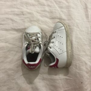 Adorable Adidas sneakers with pink trim!